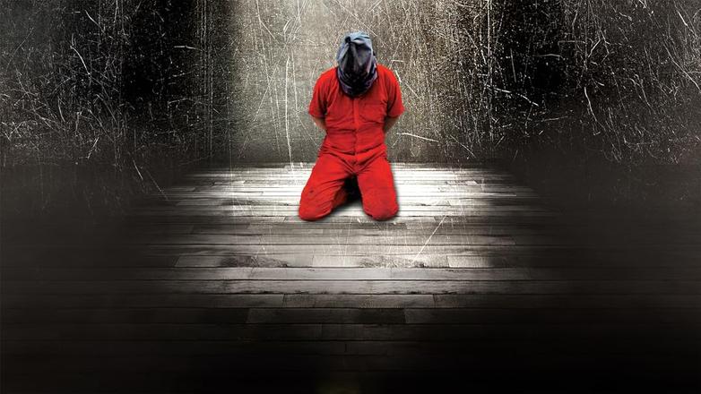 Why is our Julian Knight currently condemned in solitary confinement by Corrections Victoria?